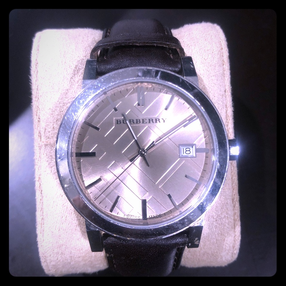 Woman’s brown leather Burberry watch
